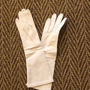 White leather gloves